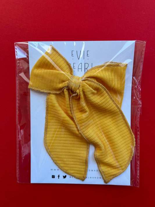 *Oversized Bows: Solid Red or Yellow